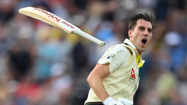 Pat Cummins throws his bat after hitting the winning runs at Edgbaston in the opening Ashes test match.