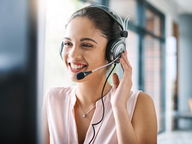 Cropped shot of an attractive young woman working in a call center