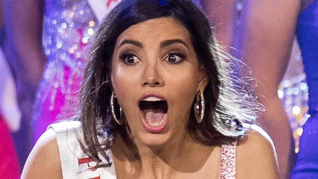 Miss Puerto Rico Stephanie Del Valle (C) reacts after winning in the Grand Final of the Miss World 2016 pageant at the MGM National Harbor December 18, 2016 in Oxon Hill, Maryland. / AFP PHOTO / ZACH GIBSON