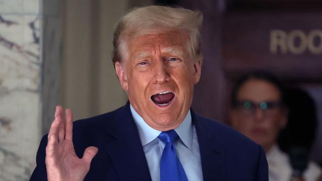 Former President Donald Trump speaks to the media during a break in his civil fraud trial at New York State Supreme Court on October 24, 2023 in New York City. (Photo by SPENCER PLATT / GETTY IMAGES NORTH AMERICA / Getty Images via AFP)