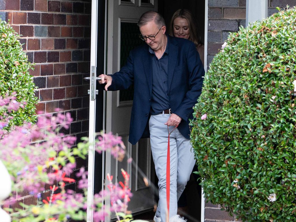 Prime Minister Anthony Albanese and his partner Jodie Haydon walk out his front-door in Marrickville. Picture: NCA NewsWire / Flavio Brancaleone