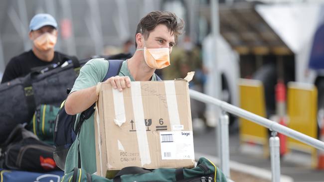 Australian paceman Pat Cummins lands in Sydney last Thursday before going into a two-week quarantine lockdown.