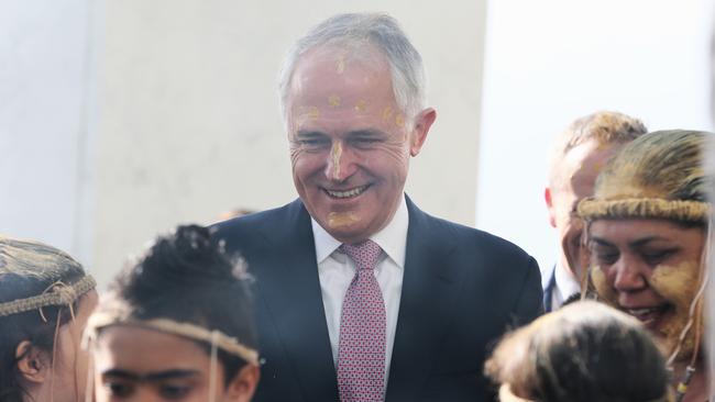 Prime Minister Malcolm Turnbull takes part in a smoking ceremony on the forecourt of Parliament House in Canberra marking the opening of the 45th federal Parliament. Picture: Ray Strange.