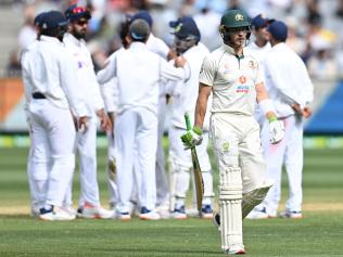 MELBOURNE, AUSTRALIA - DECEMBER 28: Tim Paine of Australia walks off the field after being dismissed by Ravindra Jadeja of India during day three of the Second Test match between Australia and India at Melbourne Cricket Ground on December 28, 2020 in Melbourne, Australia. (Photo by Quinn Rooney/Getty Images)