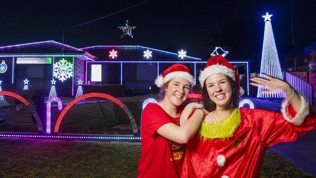 Mia Curtis (left) and Talia Kirstenfeldt at Talia's Kearneys Spring Christmas lights display. Picture: Kevin Farmer