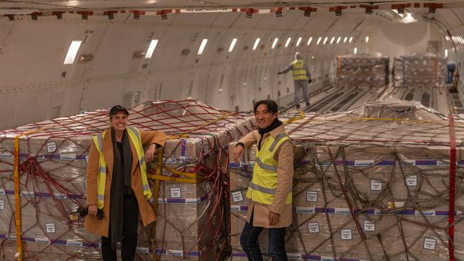 Bubs boss Kristy Carr and executive chairman Dennis Lin with a plane load of infant formula bound for the US. Picture: Asanka Ratnayake/Getty