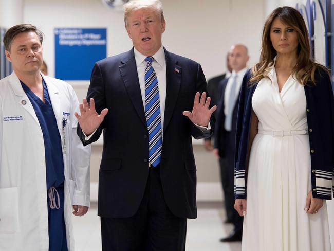 Broward Health North hospital’s Dr Igor Nichiporenko with US President Donald Trump and First Lady Melania Trump as they visit first responders and victims from last week’s shooting. Picture: Jim Watson/AFP