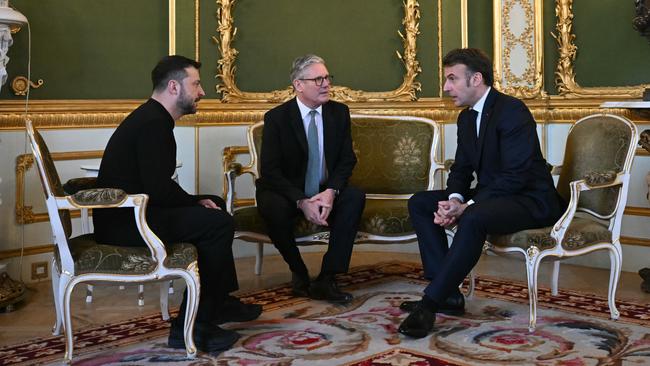 Ukraine's President Volodymyr Zelensky, Britain's Prime Minister Keir Starmer and France's President Emmanuel Macron hold a meeting during a summit at Lancaster House on March 2 in London. Picture: Justin Tallis via Getty Images