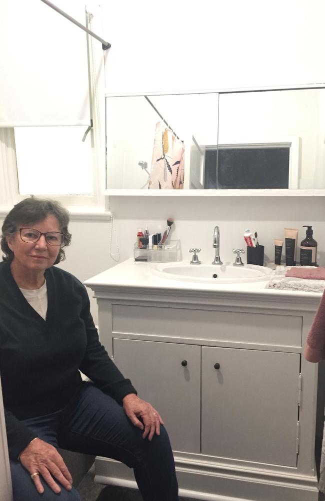 Lou’s aunt, Bernadette in her new bathroom. Picture: Supplied