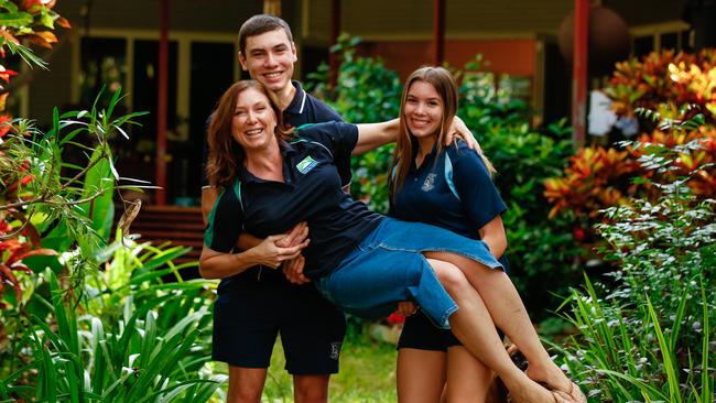 AUSMAT co-ordinator Abi Trewin with her children William, 17, and Ella, 16, at their Girraween home. Picture: Glenn Campbell