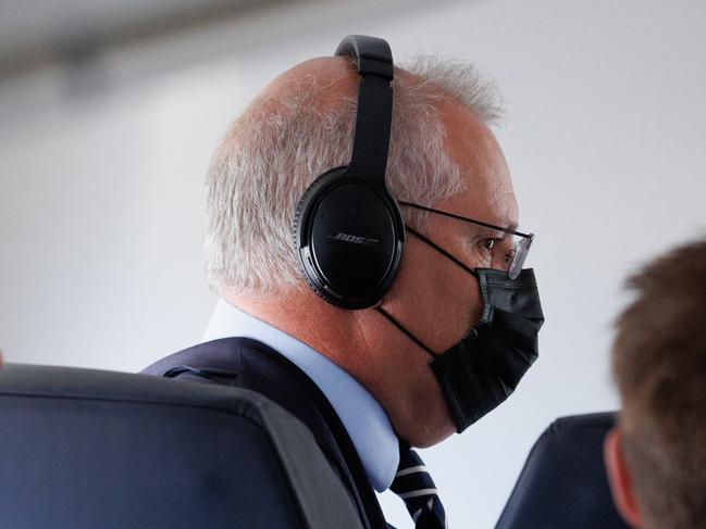 ELECTION TEAM 2022 LIBERAL BUS TOUR 26/4/2022  PMO and the Prime Minister Scott Morrison board the media plane after a water leak grounded bbj. Yaron Finkelstein boards plane.   Picture: Jason Edwards