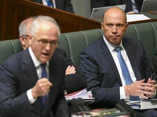 ATTEMPTED SPILL: Australian Home Affairs Minister Peter Dutton behind Australian Prime Minister Malcolm Turnbull. Picture: LUKAS COCH