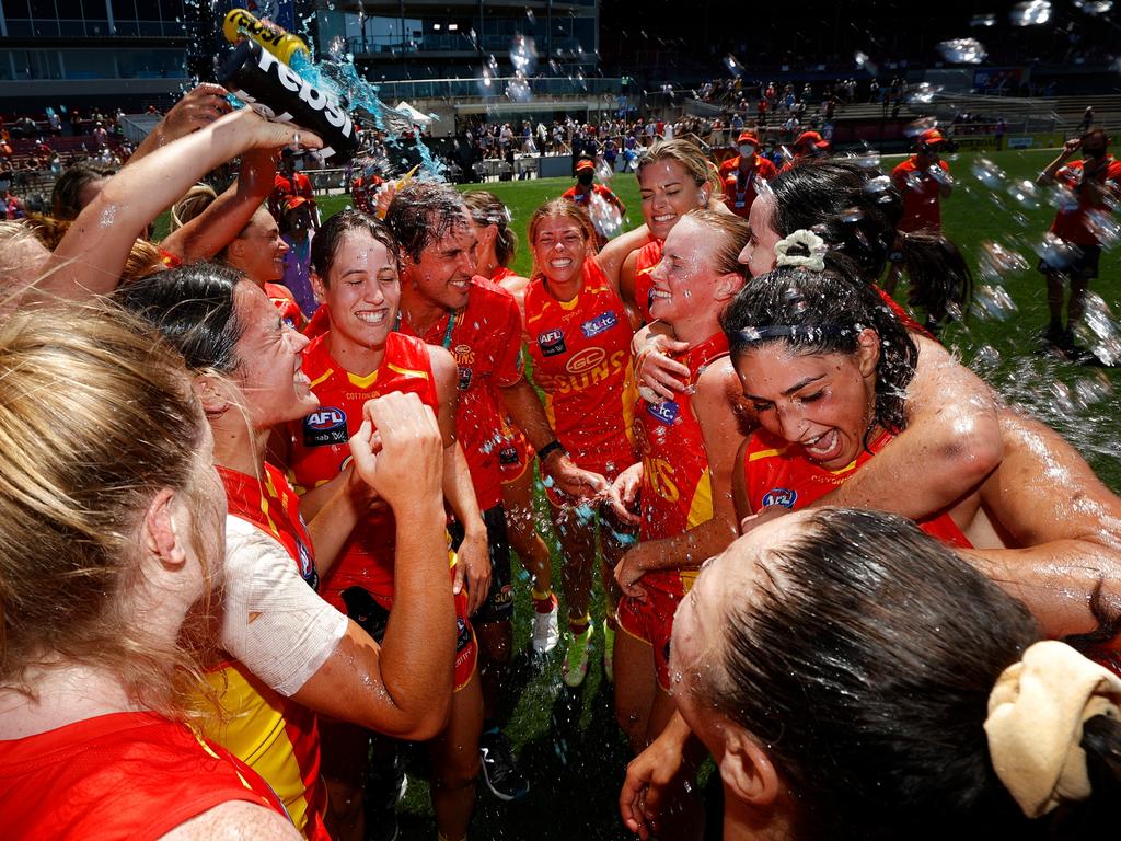 Gold Coast players celebrate after defeating the Eagles in Round 2. Picture: Michael Wilson/AFL Photos via Getty Images