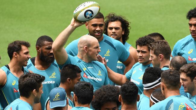 Teammates pay tribute to Stephen Moore at training.