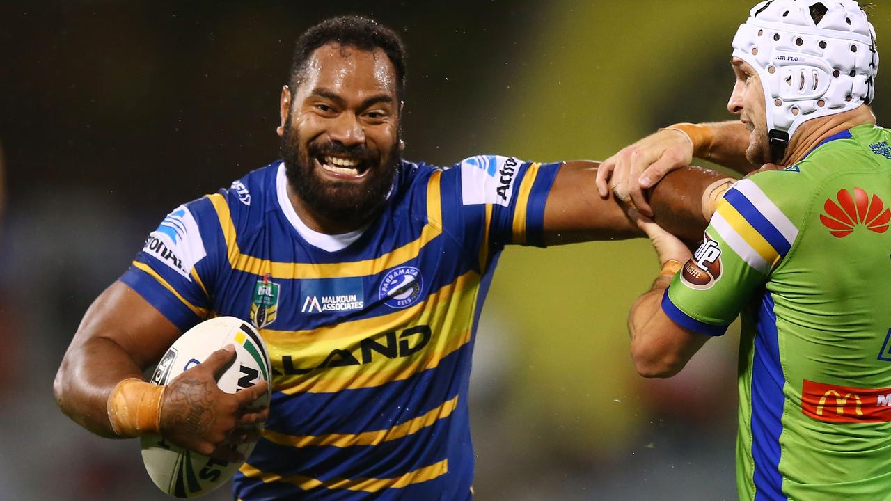 CANBERRA, AUSTRALIA - APRIL 14: Tony Williams of the Eels palms off Jarrod Croker of the Raiders during the round six NRL match between the Canberra Raiders and the Parramatta Eels at GIO Stadium on April 14, 2018 in Canberra, Australia. (Photo by Mark Nolan/Getty Images)