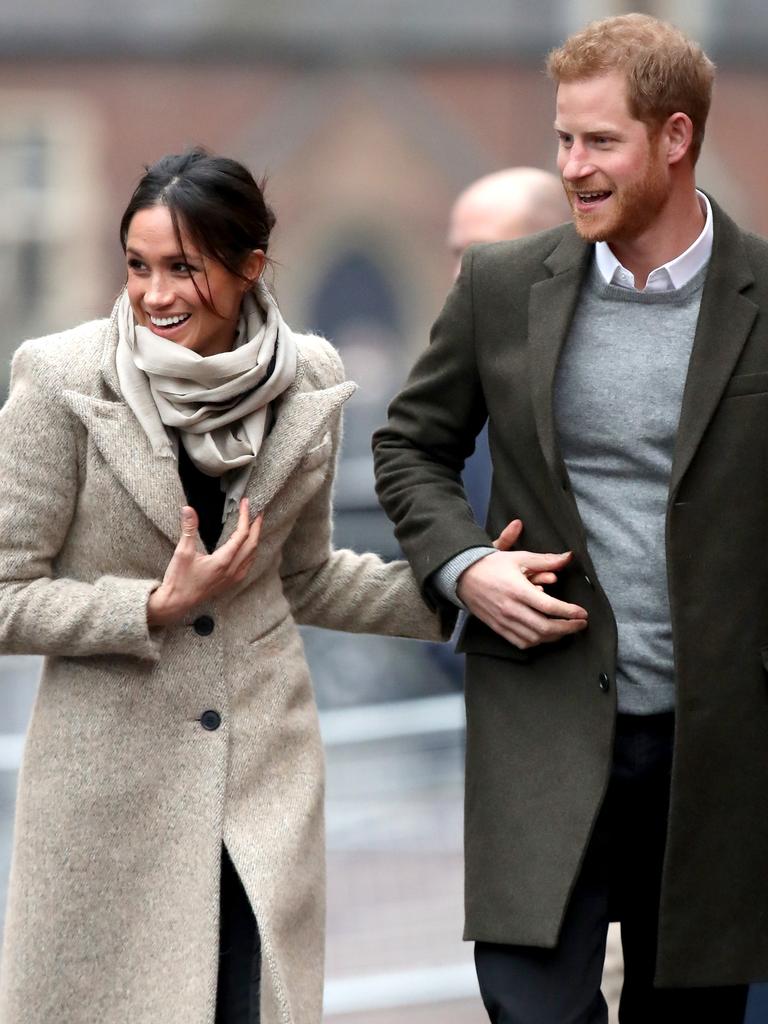 LONDON, ENGLAND - JANUARY 09: Prince Harry (R) and his fiancee Meghan Markle visit Reprezent 107.3FM on January 9, 2018 in London, England. The Reprezent training programme was established in Peckham in 2008, in response to the alarming rise in knife crime, to help young people develop and socialise through radio. (Photo by Chris Jackson/Getty Images)