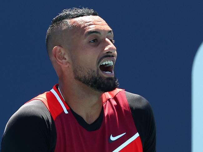 MIAMI GARDENS, FLORIDA - MARCH 29: Nick Kyrgios of Australia reacts after receiving a code violation from the referee in the tiebreak of the first set against Jannik Sinner of Italy during the Miami Open at Hard Rock Stadium on March 29, 2022 in Miami Gardens, Florida.   Michael Reaves/Getty Images/AFP == FOR NEWSPAPERS, INTERNET, TELCOS & TELEVISION USE ONLY ==