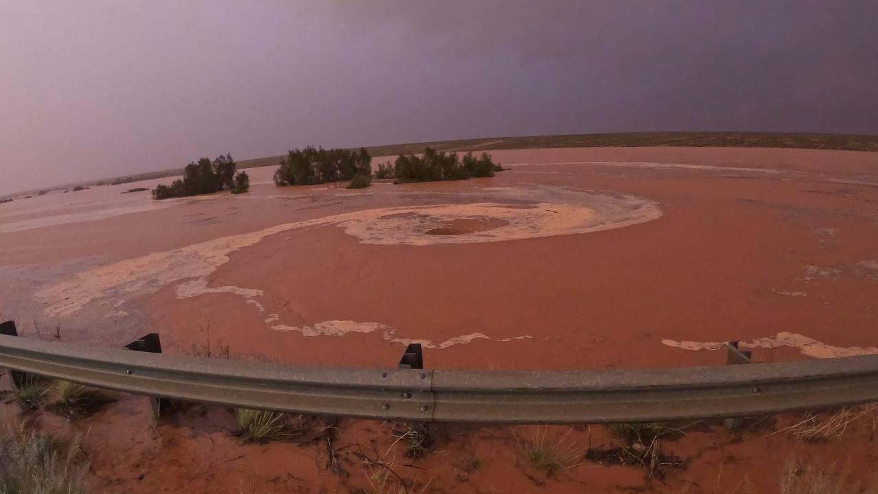 A huge whirlpool that opened up on the side of the Stuart Highway after floods. Pictures: Ineos Automotive