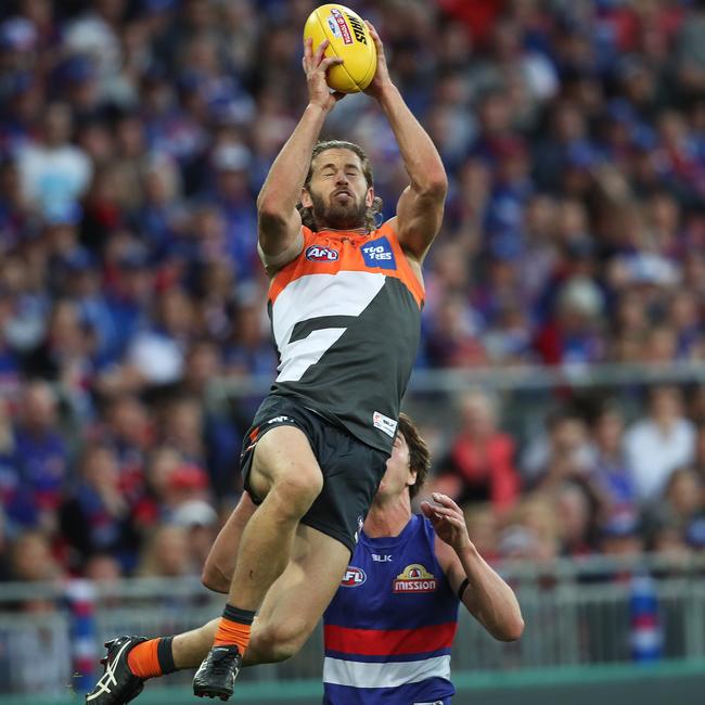 Callan Ward flew for a mark early in the 2016 preliminary final, before he was badly concussed in the second quarter of the historic match. Picture: Phil Hillyard