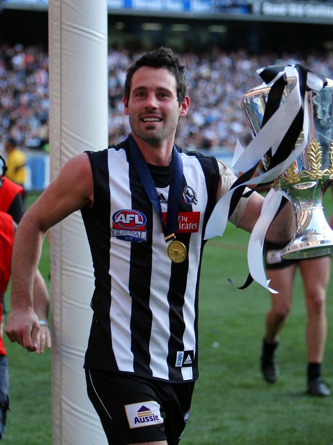 Didak with the 2010 premiership cup.