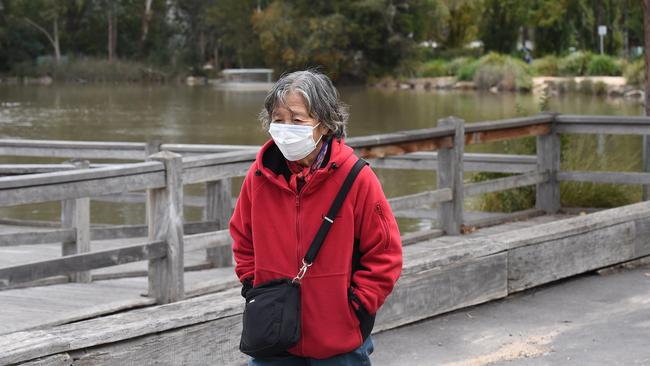 A woman exercises at Ringwood Lake. Picture: Josie Hayden