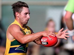 11/04/15 Woodville west Torrens v West Adelaide at Woodville. Shannon Green chases James Boyd. photo Calum Robertson