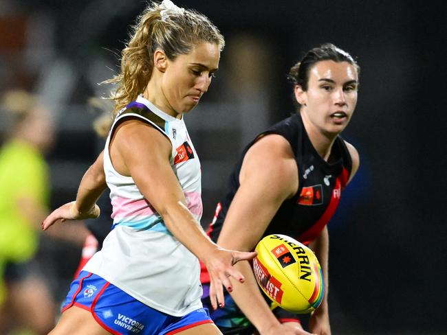 MELBOURNE, AUSTRALIA - OCTOBER 11: Dominique Carruthers of the Bulldogs kicks during the round seven AFLW match between Western Bulldogs and Essendon Bombers at Mission Whitten Oval, on October 11, 2024, in Melbourne, Australia. (Photo by Quinn Rooney/Getty Images)