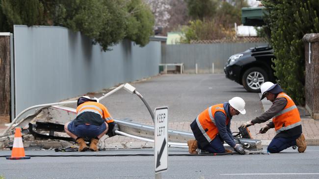 Workers are trying to clear the road. Picture: Tait Schmaal.