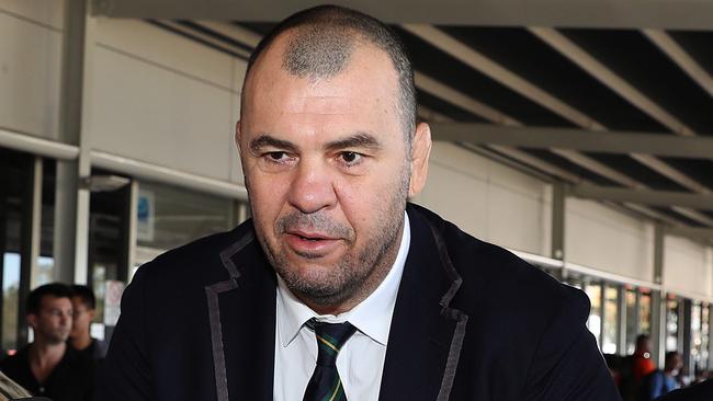 Former Wallabies coach Michael Cheika arrives back in Sydney following the World Cup quarter-final defeat to England. Picture: Brett Costello