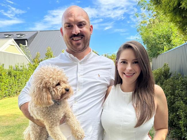 Stacey Lee with her husband Ben Millar and their dog Murray. Picture: Supplied