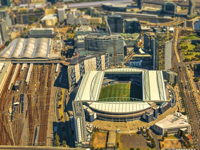 Melbourne's Southern Cross Station and Etihad Stadium. Picture: Ben Thomas/City...