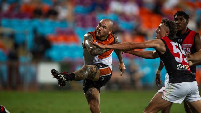 Jayden Magro boots a goal as the NTFL Buffaloes' mens side beat the Essendon Bombers. Picture: Pema Tamang Pakhrin