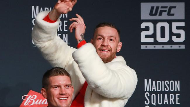 Conor McGregor of Ireland dances out on stage during the UFC 205 press conference.