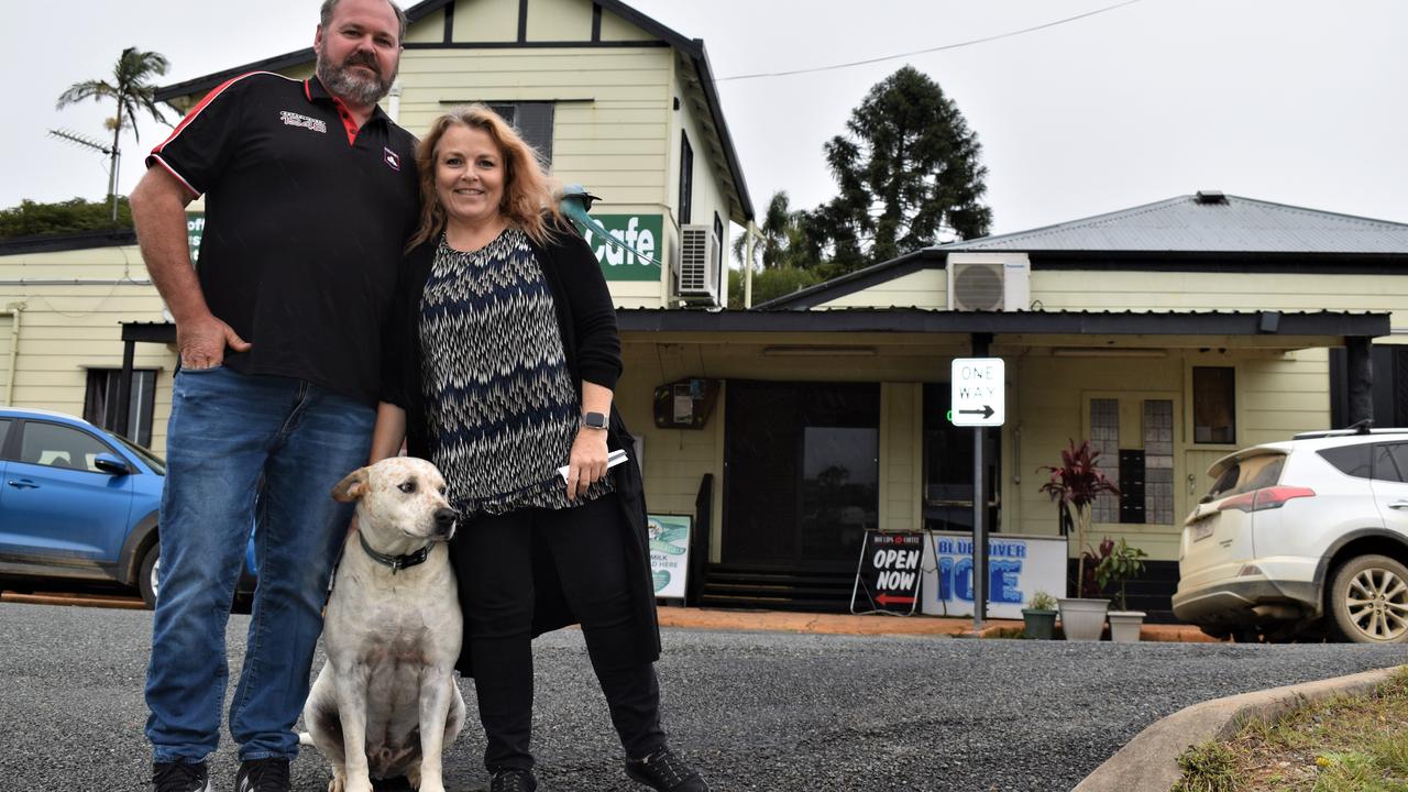 Eungella General Store owners Jamie Mussig and Michaela Pritchard with their shop pets, Tully the dog and Sammy aka Chookie the ringneck parrot, wanted to thank the community for all of their support. Picture: Heidi Petith