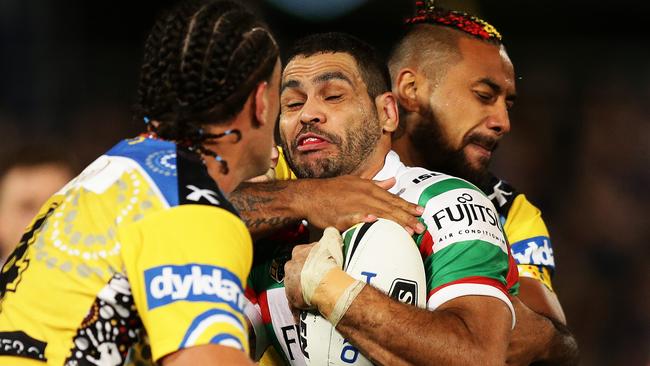 Rabbitohs star Greg Inglis takes on the Eels defence. Picture: Brett Costello