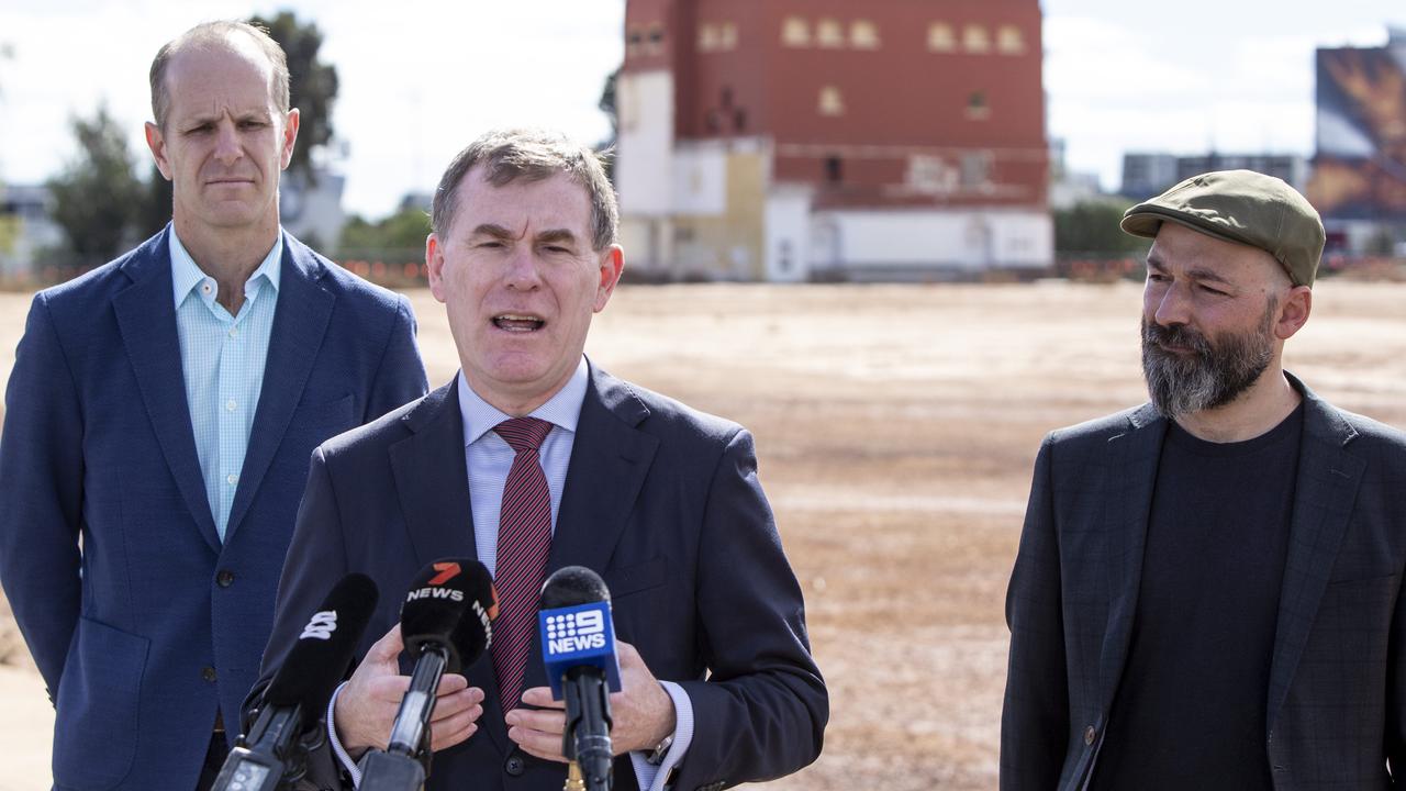 Housing Minister Nick Champion (centre), UDIA state chief executive Liam Golding and Arup Design’s Orr Shallev (cap) at the former West End Brewery on April 13. Picture: Brett Hartwig