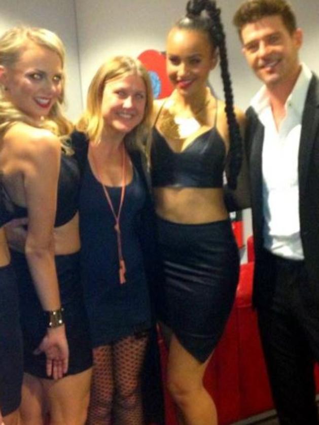 Stylist Shannon Meddings with singer Robin Thicke and his dancers, who she styled