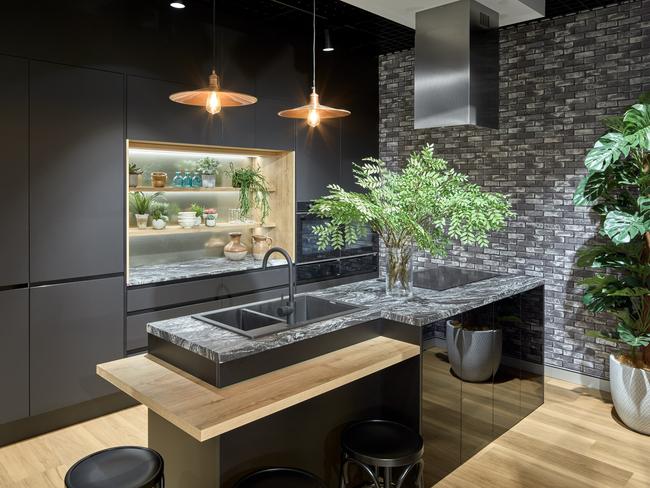 A design by Nobby Kitchens featuring marble-look laminate benchtops.