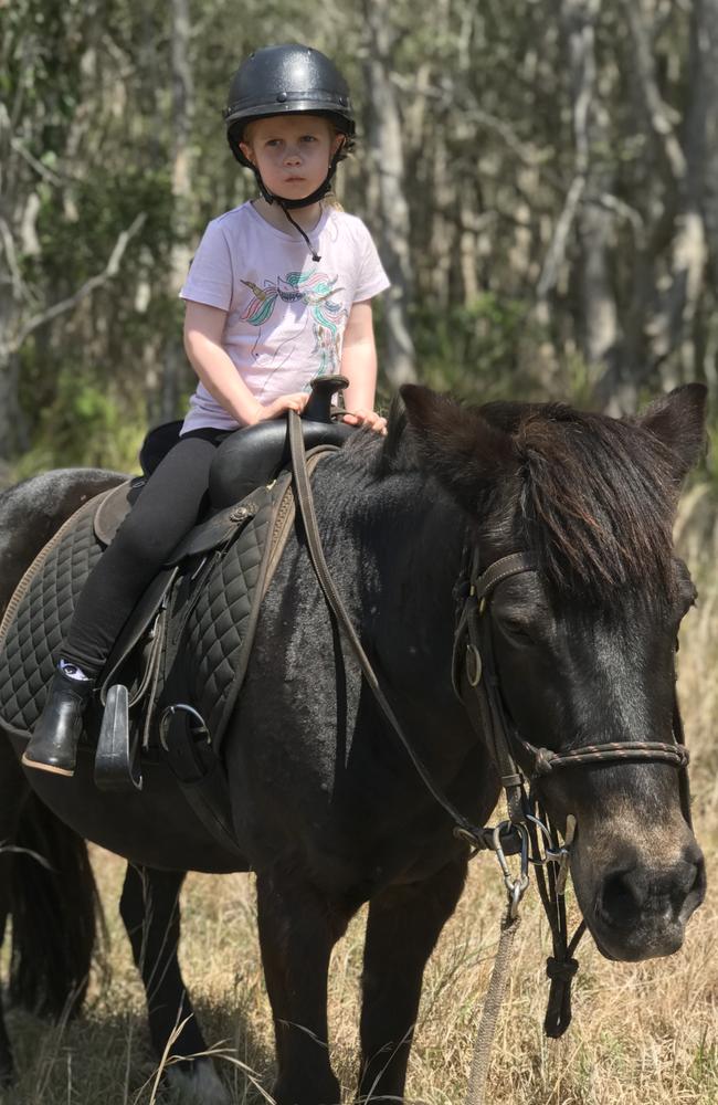 She looked terrified but hasn't stopped talking about her horse Bubba. Picture: Zephyr Horse Riding