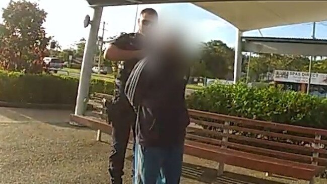 Police arresting a 20-year-old man at Harbour Town on Saturday morning over an alleged assault and attempted robbery. Picture: Queensland Police