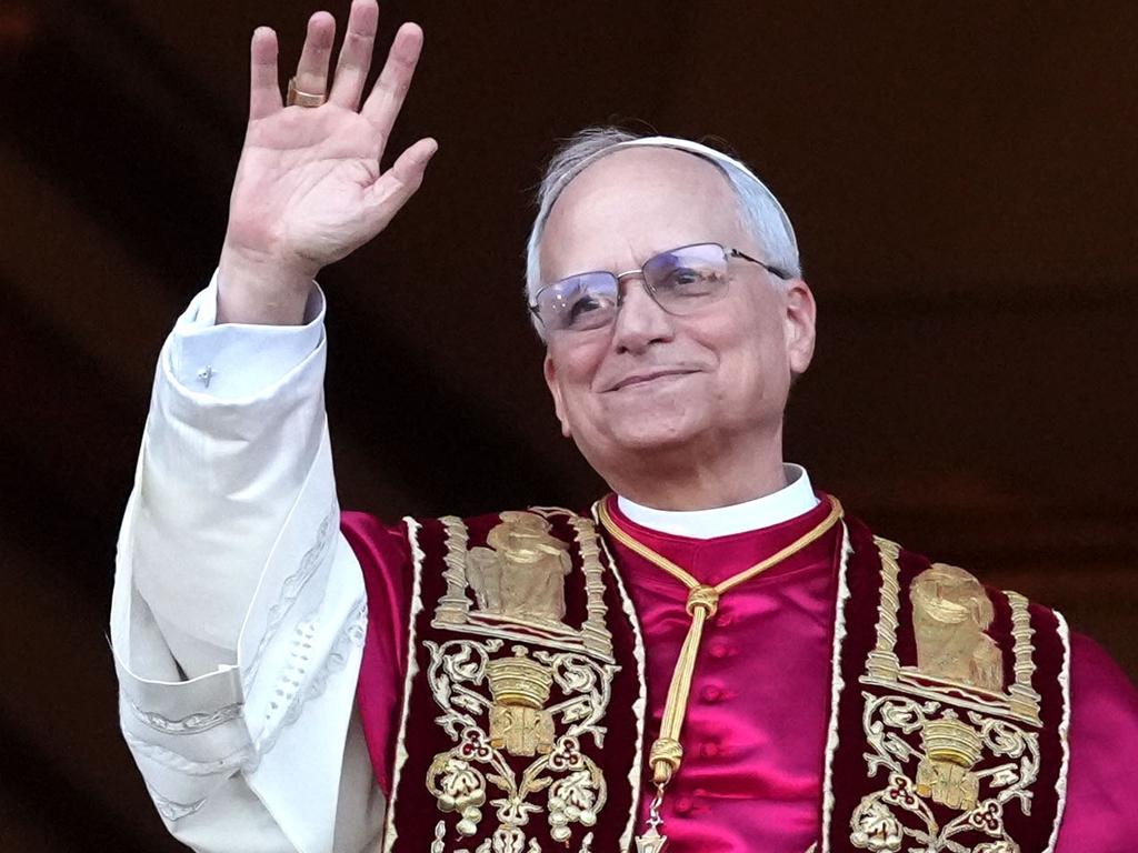 The newly elected Pontiff is seen for the first time from the Vatican balcony. Picture: Getty Images