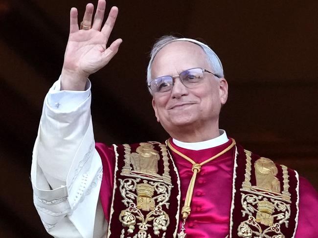 The newly elected Pontiff is seen for the first time from the Vatican balcony. Picture: Getty Images