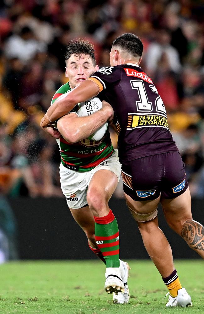 Cameron Murray of the Rabbitohs is tackled by Jordan Riki of the Broncos during the round one NRL match between the Brisbane Broncos and the South Sydney Rabbitohs. Picture: Getty Images