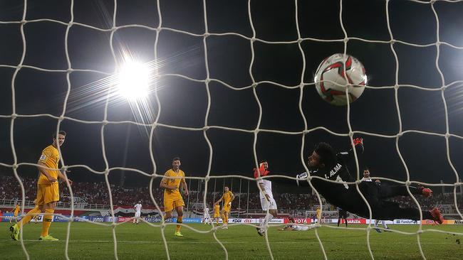 Syria goalkeeper Ibrahim Alma can’t stop Rogic’s matchwinner. (Francois Nel/Getty Images)