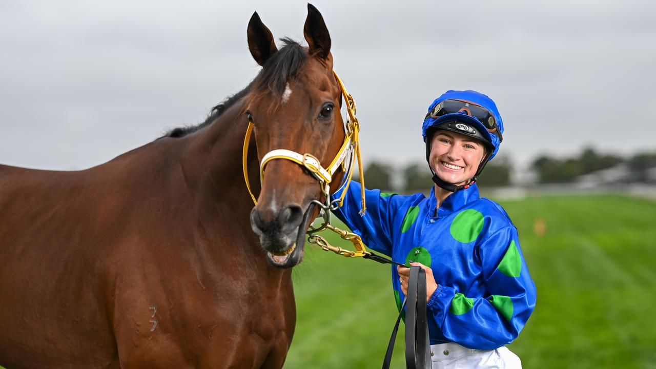 Apprentice jockey Caitlin Hollowood poses with Chicago Bear (IRE) in Cranbourne, Victoria.