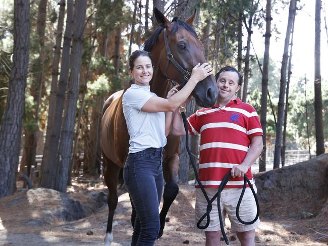 Former Melbourne Cup winning jockey Michelle Payne with brother Stevie Payne and horse Alhambra Lad that will run in the 2024 Hobart Cup.  Picture: Nikki Davis-Jones