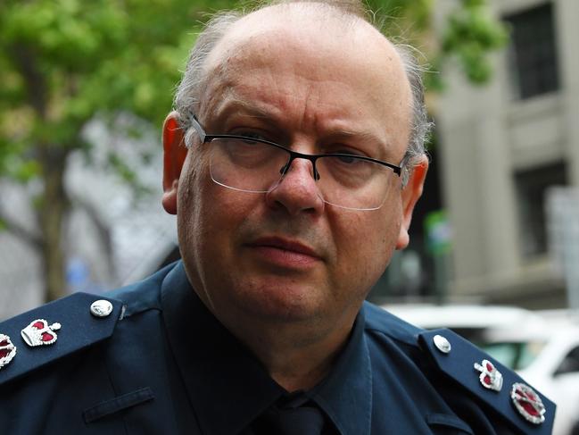 Victoria Police Chief Commissioner Graham Ashton arrives to the Royal CommissionÂ into the Management ofÂ Police Informants at the Fair Work Commission in Melbourne, Tuesday, December 10, 2019. (AAP Image/James Ross) NO ARCHIVING