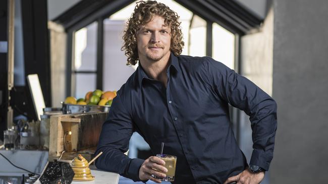 Former Bachelor Nick Cummins aka 'The Honey Badger' enjoying The Honey Trap cocktail at the Hennessy Bar in the Mayfair. Picture: Simon Cross