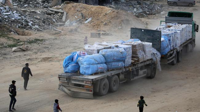 A truck loaded with humanitarian aid drives through Rafah before Israel’s blockade of food, fuel and medicine. Picture: AFP.