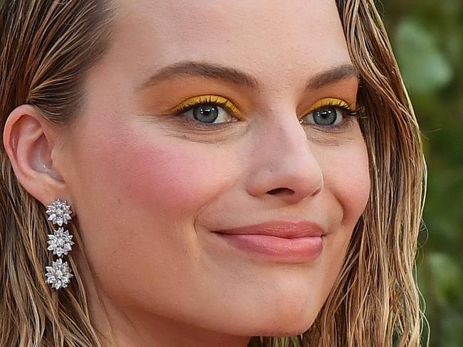 Australian actress Margot Robbie poses upon arrival for the World Premiere of the film, 